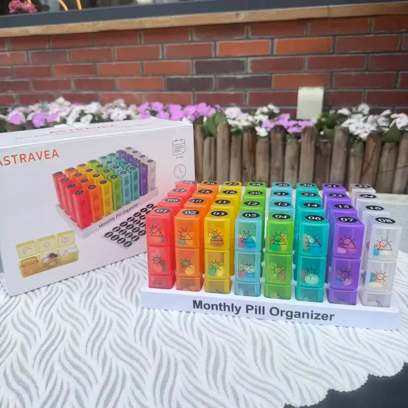 ASTRAVEA 31-Day Monthly Pill Organizer - Bpa-Free Supplement & Medical Organizer, Color-Coded Compartmentalized Dispenser with 32 Pre-Sorted AM/PM Daily Strips, Portable Travel Storage Box